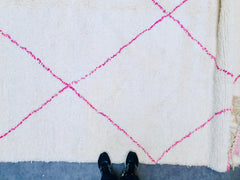 Transform your home with this exquisite handmade Moroccan rug, showcasing a mesmerizing blend of green and blue abstract patterns. Woven from natural wool by skilled artisans, this rug features a unique tribal design that adds a bohemian touch to any room. The plush, high-pile texture provides unmatched comfort underfoot, making it ideal for living rooms, bedrooms, or reading nooks. Whether you're aiming for a mid-century modern look or a cozy boho vibe, this versatile rug effortlessly enhances your space w