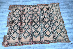 Elevate your home with this stunning antique Boujaad Moroccan rug, a true masterpiece of tribal artistry. Handcrafted using premium wool, this vintage rug boasts vibrant colors and bold geometric designs, reflecting centuries-old Berber traditions. Its distressed finish adds a rustic, lived-in charm, making it ideal for eclectic, boho, or minimalist interiors. Whether used as a floor rug, wall hanging, or layered accent, this handmade piece brings warmth, texture, and cultural heritage to any room.