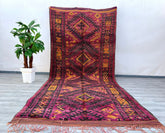 Enhance your home with this stunning antique Turkmen kilim rug, showcasing a striking geometric pattern in rich, earthy tones. Handwoven by nomadic tribes using organic wool and vegetable dyes, this flat-weave rug is both durable and soft underfoot. The intricate tribal motifs tell a story of tradition and artistry, making it a unique centerpiece for any room. Ideal for living rooms, dining areas, or as a statement hallway runner, this vintage kilim adds texture and warmth to rustic, eclectic, or minimalist