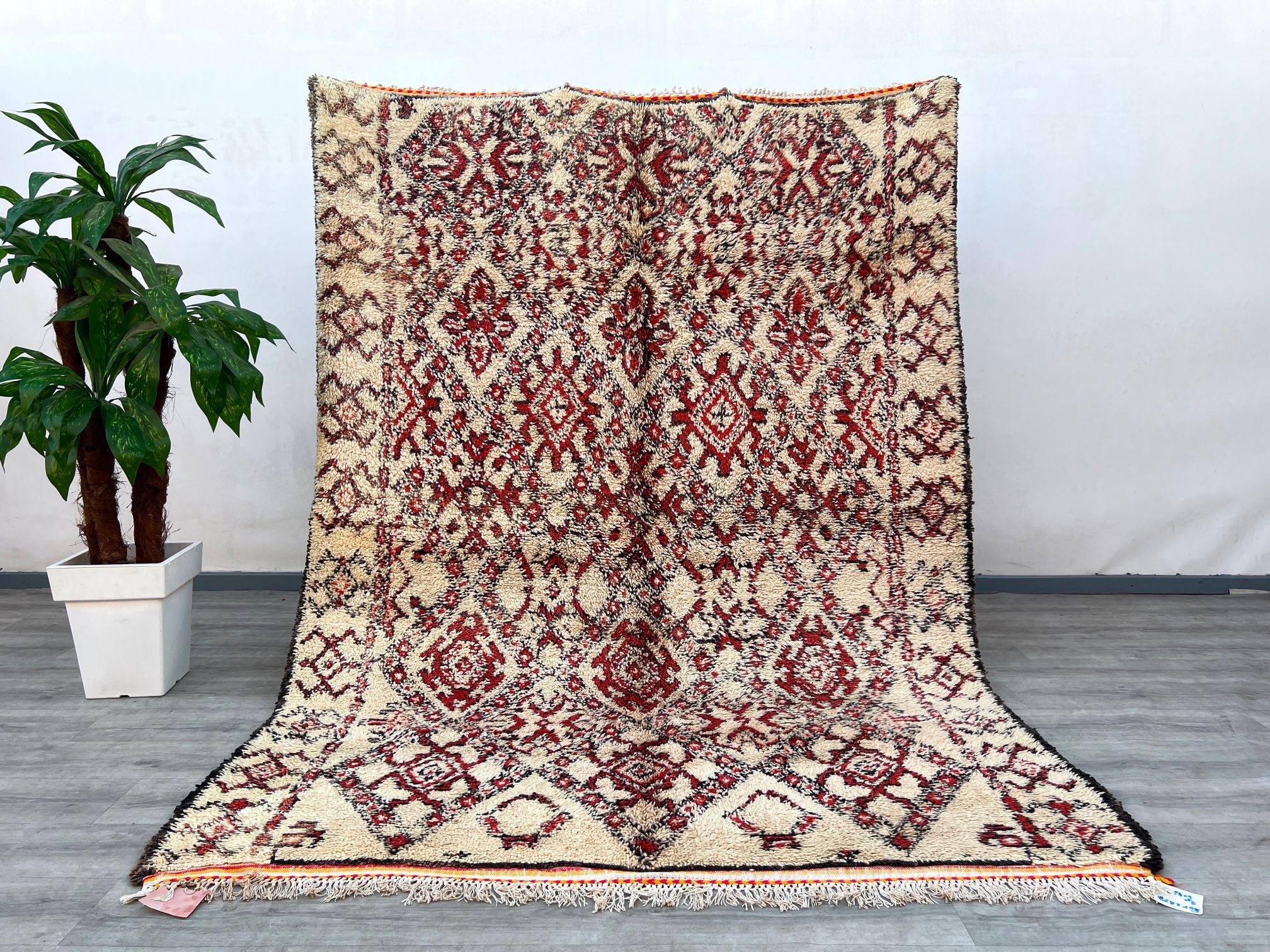 Discover the charm of a handmade Turkish Kilim rug, a vibrant vintage piece woven with precision. This thin, lightweight Kilim features bold geometric patterns in red, black, and cream, creating a striking focal point for any room. Measuring 2x5 ft, it’s ideal for small spaces, entryways, or as a decorative wall hanging. The flat-weave technique ensures durability, while the soft, delicate texture adds comfort underfoot. With its tribal-inspired motifs and colorful distressed look, this authentic Anatolian