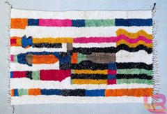 Upgrade your space with authentic Beni Ourain rugs, handwoven by Moroccan artisans. These soft wool Berber rugs come in 5x8 ft, 8x10 ft, or custom sizes, ideal for living rooms, bedrooms, or studio decor. Choose from colorful tribal patterns, minimalist designs, or fluffy shag carpets in white, cream, or multicolored styles. Our handmade Moroccan carpets are durable, hypoallergenic, and ethically sourced, blending boho chic, mid-century modern, and Scandinavian aesthetics. Shop discounted luxury rugs with f