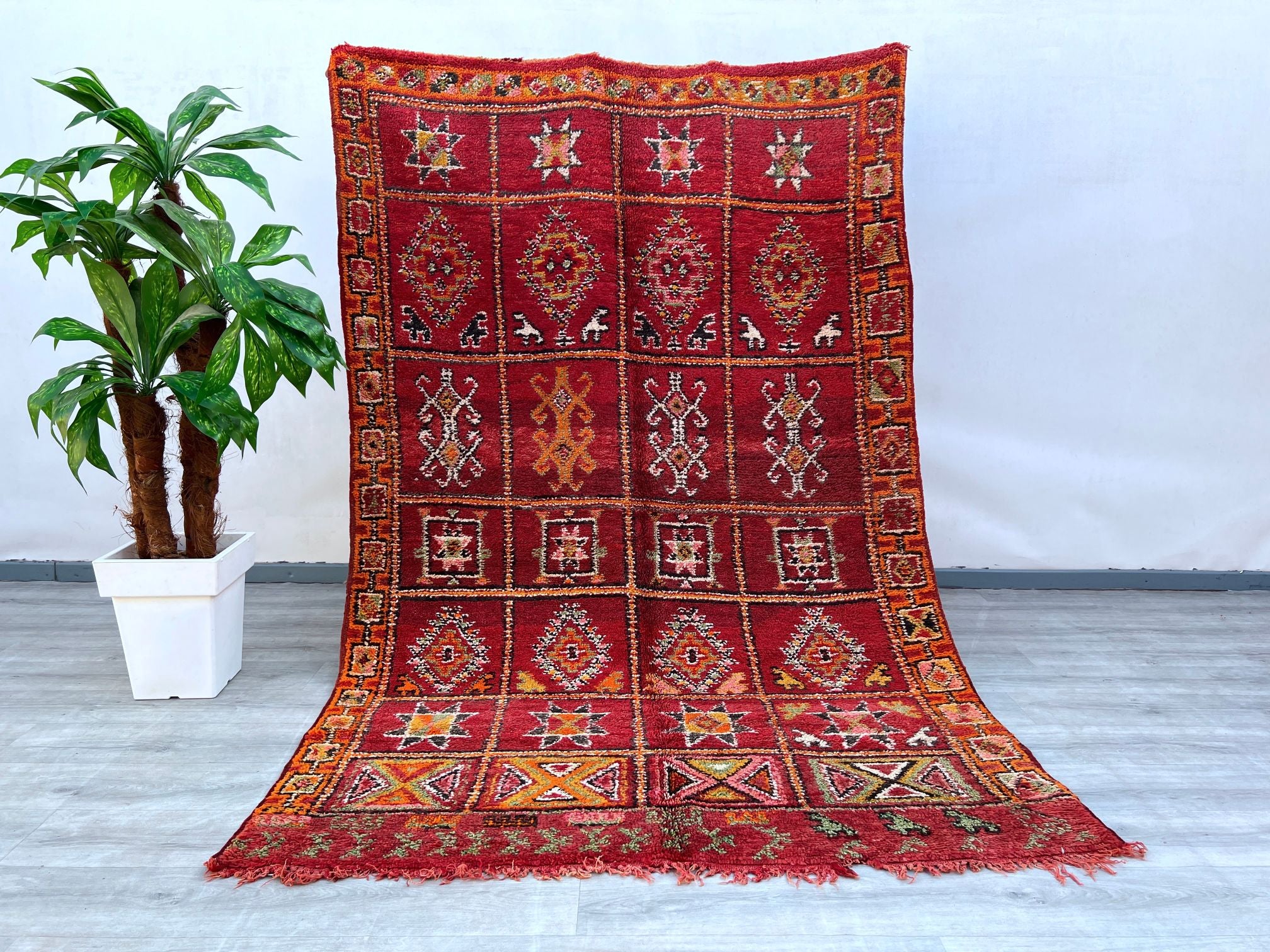 Elevate your interior with this stunning bohemian-style vintage Moroccan rug, meticulously handwoven using natural wool. Featuring a captivating blend of tribal motifs and faded hues, this rug exudes a relaxed, artistic vibe that enhances any room. Its distressed look adds character, making it ideal for boho-chic, farmhouse, or minimalist settings. The plush texture provides comfort, while the durable construction ensures long-lasting beauty. A perfect choice for those seeking an authentic, one-of-a-kind pi