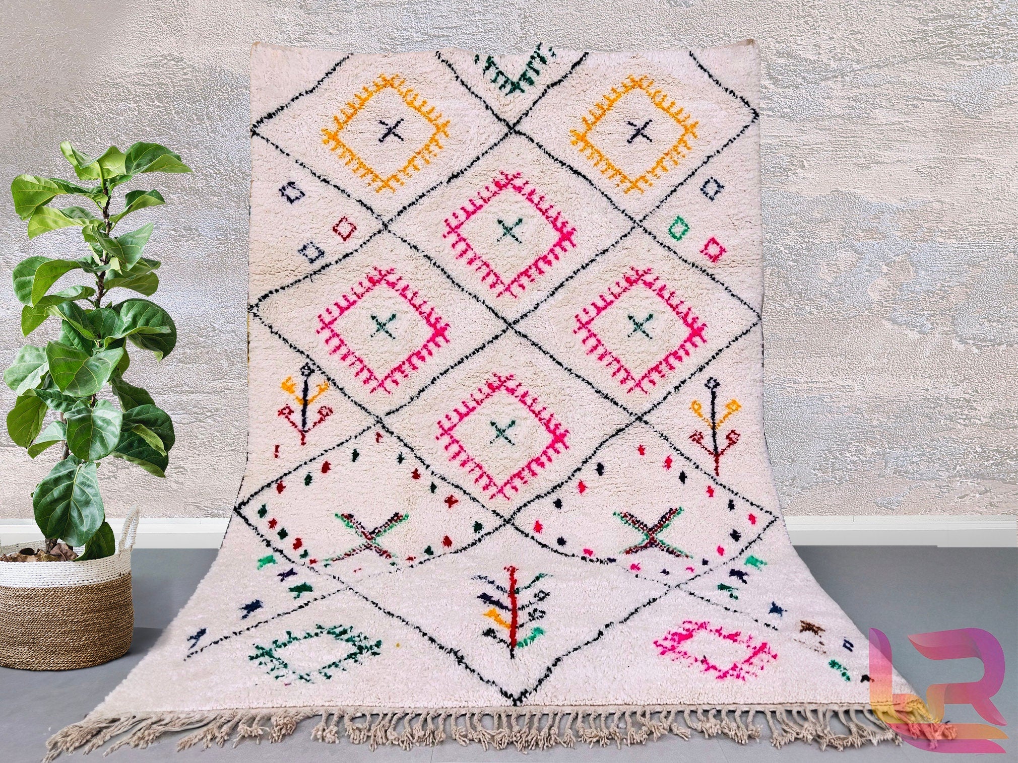 Elevate your interior with this boho Moroccan rug, a stunning handwoven wool masterpiece featuring traditional Berber motifs. The rich textures and vibrant patterns make it a standout piece for modern and eclectic decor. Made from premium natural wool, this durable yet plush rug adds warmth and character to living rooms, dining areas, or cozy reading nooks. Each rug is one-of-a-kind, ensuring a truly unique addition to your home. Available in custom sizes, this authentic Moroccan carpet blends artistry with