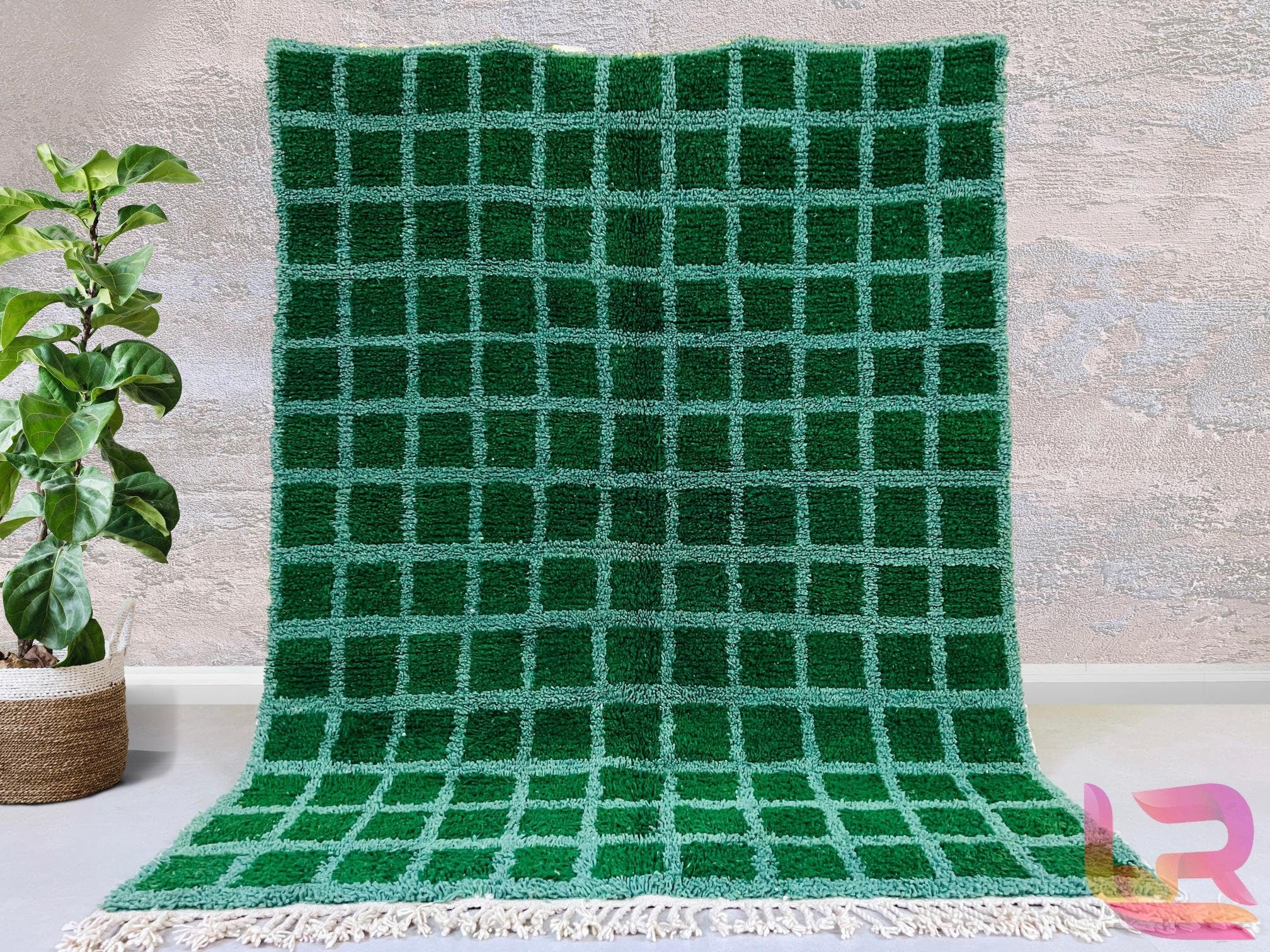 Create a cozy, inviting atmosphere with this custom Beni Ourain style rug, meticulously handcrafted by skilled artisans. Made from natural wool, this soft Berber carpet features a beautiful checkered or grid design, adding texture and warmth to any space. The neutral and green color options make it easy to match with various decor styles, from bohemian to modern minimalist. Whether used as a floor rug, area rug, or decorative accent, this handwoven wool rug is both durable and stylish. Free worldwide shippi