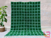 Create a cozy, inviting atmosphere with this custom Beni Ourain style rug, meticulously handcrafted by skilled artisans. Made from natural wool, this soft Berber carpet features a beautiful checkered or grid design, adding texture and warmth to any space. The neutral and green color options make it easy to match with various decor styles, from bohemian to modern minimalist. Whether used as a floor rug, area rug, or decorative accent, this handwoven wool rug is both durable and stylish. Free worldwide shippi
