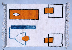 Bring timeless elegance to your home with this handmade Beni Ourain Moroccan rug, crafted by skilled artisans using traditional Berber techniques. Made from 100% natural wool, this rug features the iconic geometric tribal patterns of the Atlas Mountains, blending minimalist charm with boho flair. The soft, plush texture provides warmth and comfort, making it perfect for living rooms, bedrooms, or cozy reading nooks. Each rug is unique, with slight variations that highlight its authentic handmade nature. Whe