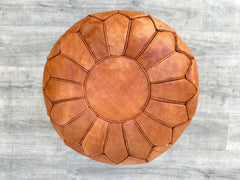 Relax in luxury with a large leather pouffe (up to 30" wide) featuring hand-tooled seams and vegetable-tanned hides. Designed for longevity, these ottomans resist fading and soften over time. Use as a footrest, side table, or extra seating in home offices or lounges. Brands like Article, Crate & Barrel, and L.L.Bean offer premium options in saddle brown, cognac, or distressed finishes. Free shipping + 30-day returns. Invest in a heirloom-quality leather ottoman today!