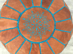 Upgrade your space with contemporary leather ottomans designed for style and function. Choose from square leather cubes, round poufs, or long benches with hidden storage compartments. Upholstered in buttery-soft genuine or bonded leather, these mid-century modern ottomans work as footrests, coffee tables, or extra seating. Features include reversible trays, solid wood legs, and tufted detailing. Ideal for small apartments, lounges, or home offices. Durable, pet-friendly, and easy to maintain.