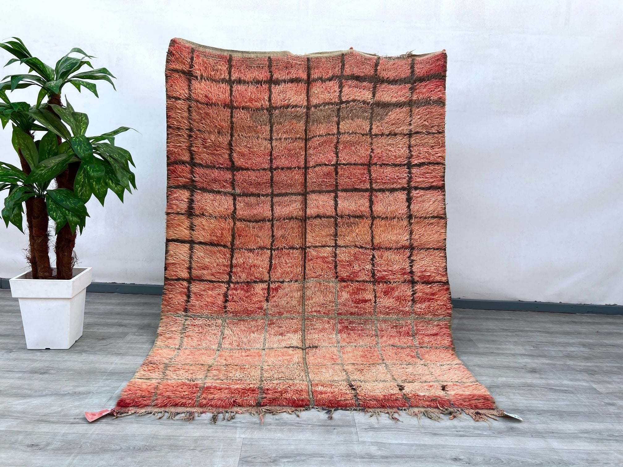 Enhance your home with this exquisite Red Moroccan Boujad Rug, a handmade Berber carpet featuring bold geometric designs and a luxurious wool texture. This vintage Kilim rug is crafted using age-old techniques, making each piece unique. Its deep red tones and tribal motifs bring warmth and bohemian flair to modern and traditional interiors alike. Whether used as a woven wool runner rug or a statement Moroccan area rug, it adds an artistic touch to living rooms, entryways, or bedrooms. A perfect blend of aut