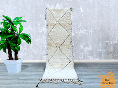 Discover the beauty of handcrafted Beni Ourain Moroccan rugs, woven by indigenous artisans using centuries-old techniques. These plush wool carpets showcase intricate diamond motifs and neutral tones, fitting effortlessly into contemporary or eclectic décor. Popular as hallway runners (2.7x9.9 ft, 3x10 ft) or statement area rugs (5x8 ft, 8x11 ft), each piece is unique, with slight variations that highlight its handmade charm. The high-pile texture provides comfort underfoot, while the durable weave ensures