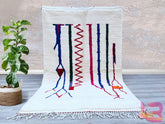 Elevate your home with a vintage Moroccan Berber rug, showcasing bold tribal motifs and a distressed, artistic finish. Hand-knotted from premium wool, these rugs offer durability and softness underfoot. Their eclectic patterns—ranging from diamond shapes to freeform symbols—add a bohemian flair to any room. Whether used as a focal point or layered with modern furniture, these rugs infuse character and global elegance. Perfect for eclectic, Scandinavian, or minimalist interiors, they blend tradition with con