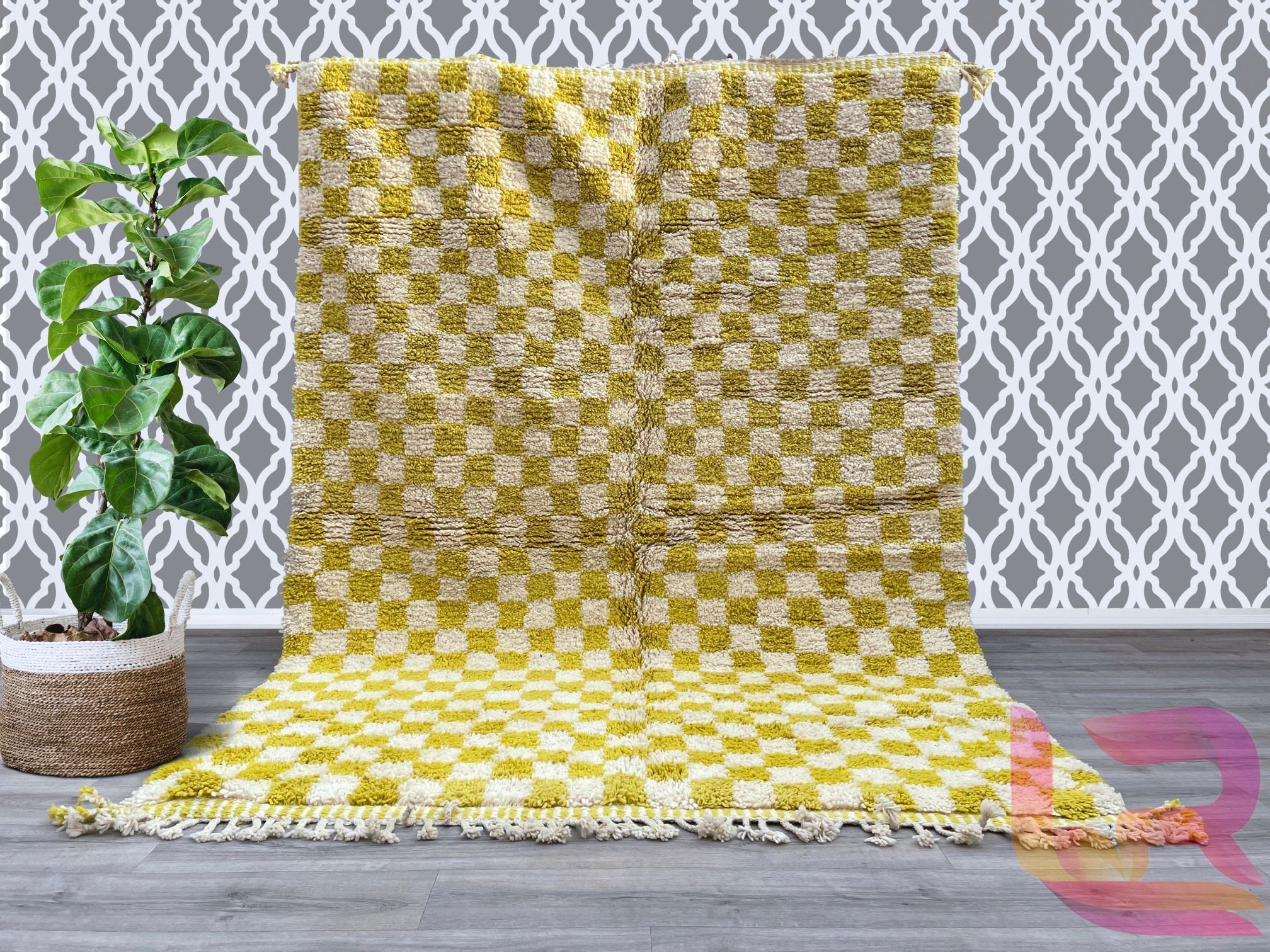 Elevate your space with this vintage Moroccan checkered rug, a stunning hand-knotted wool carpet featuring a bold checkerboard pattern in mustard yellow and cream. This Beni Ourain-style rug is handwoven by Berber women using traditional techniques, ensuring a one-of-a-kind tribal design. The soft, shaggy texture adds depth to boho, eclectic, or mid-century modern interiors, while the neutral color palette blends seamlessly with any decor. Perfect for living rooms, nurseries, or dining areas, this Moroccan