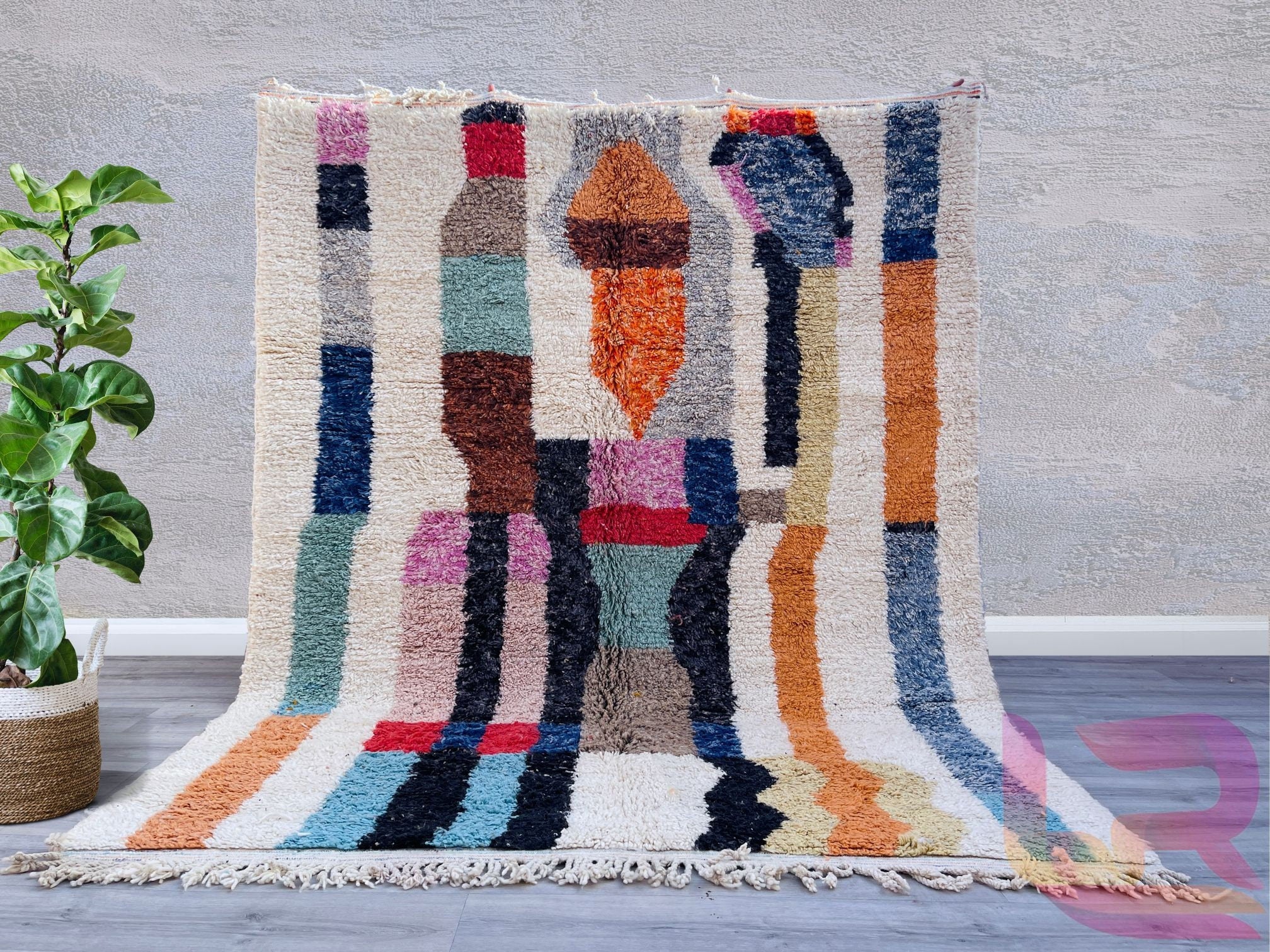 Discover the timeless beauty of an Authentic Beni Ourain Moroccan Rug, handcrafted by skilled Berber artisans using premium wool. These handmade Berber carpets feature intricate tribal patterns, blending traditional craftsmanship with modern boho aesthetics. Perfect for living rooms, bedrooms, or entryways, each Moroccan wool rug is unique, offering warmth, texture, and cultural charm. Available in custom sizes, from cozy 5x8 ft to large 9x12 ft, our Beni Ourain-style rugs add elegance to any space. Whether