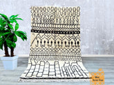 146 x 239 cm = 4.8 x 7.8 FT Handmade Moroccan Rug with Ivory Background and Black Accents – Classic Beni Ourain Style, Perfect for Minimalist Decor