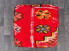 Elegant and cozy decor: Moroccan pouf kilim, antique Ottoman pouf, and cushions for meditation and yoga