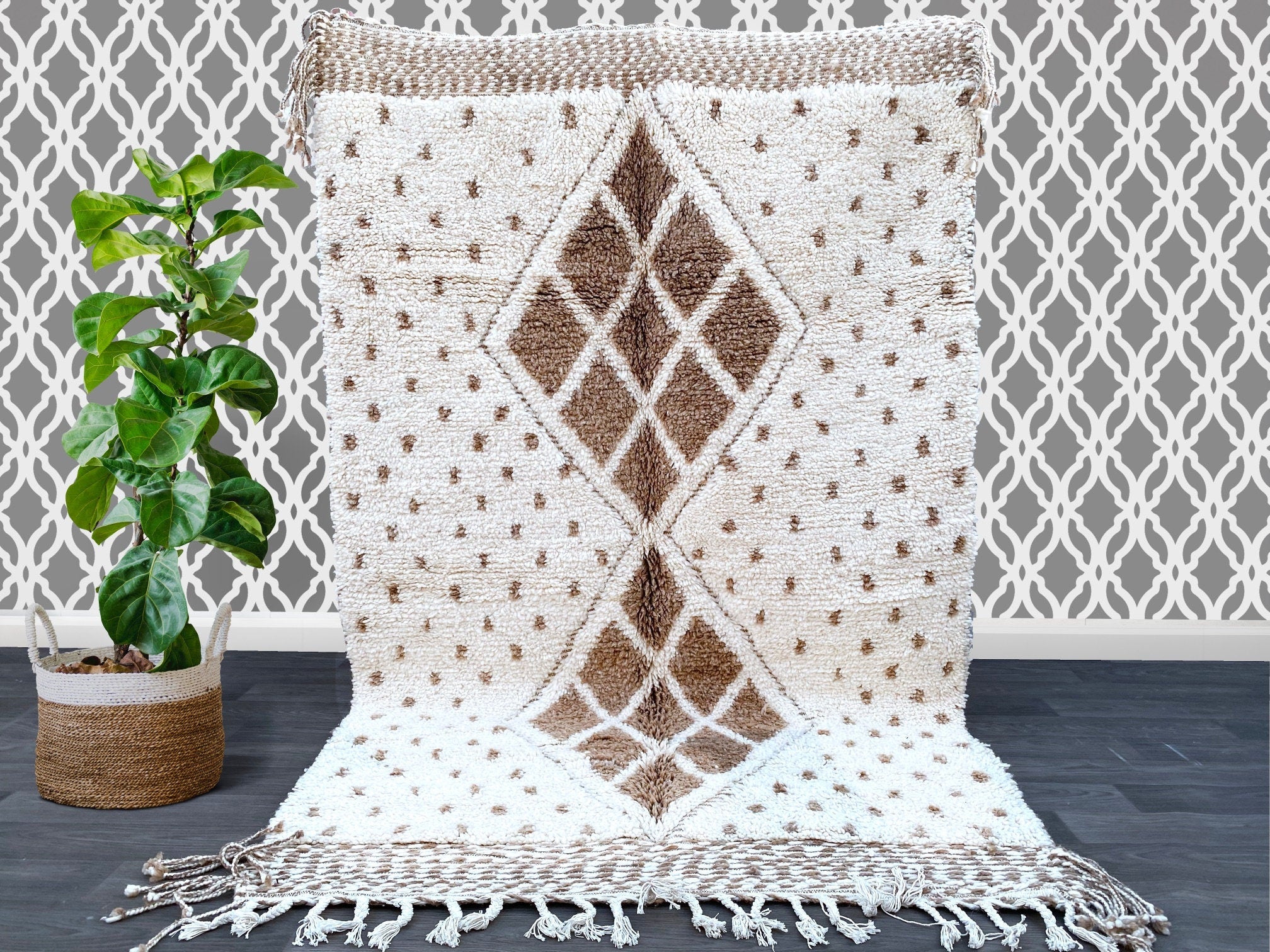 Discover the finest Beni Ouarain Berber rugs at woolberber.com—your trusted source for authentic Moroccan handwoven carpets. Each rug is crafted by skilled artisans using 100% natural wool, featuring the iconic geometric patterns and plush texture of traditional Beni Ouarain tribes. Perfect for modern and bohemian interiors, our rugs add warmth, texture, and cultural elegance to any space. Available in vintage and custom designs, these ethically sourced rugs support fair trade practices. Shop now for exclus