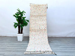 This large Moroccan Kilim Rug is a stunning combination of form and function. Handcrafted from traditional wool, it features a vintage Kilim design with vibrant colors and intricate patterns. Use it as an ottoman, or decorative piece to enhance your 