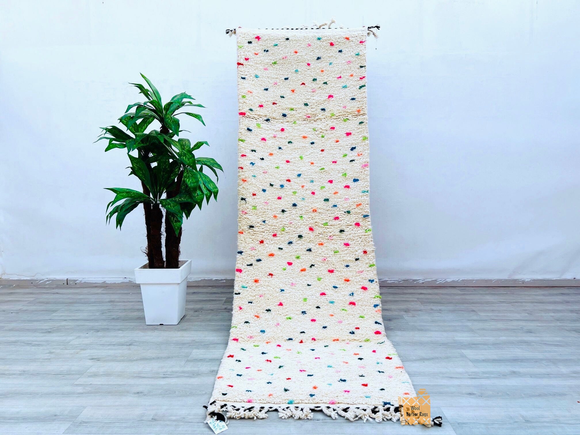 This Moroccan Rug features a vintage Kilim design, adding character and charm to your living room or bedroom. Its large size and durable wool make it a versatile piece that can be used as a Rug, or extra seating. Whether as a centerpiece or an accent, this cover brings Moroccan elegance into your home.