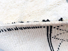 Enhance your space with a custom geometric Moroccan rug, meticulously hand-knotted from pure wool for unmatched softness and longevity. Featuring a contemporary diamond or checkerboard pattern, this rug effortlessly complements Scandinavian, mid-century, or minimalist interiors. The neutral tones and intricate weaving create a versatile piece that works as a living room centerpiece or a stylish bedroom accent. Each rug is one-of-a-kind, reflecting the rich tradition of Berber weaving while fitting seamlessl