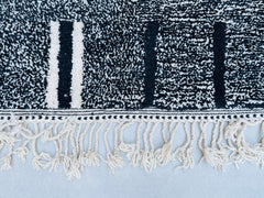 Looking for a one-of-a-kind handmade rug? Our Moroccan Berber rugs offer customizable sizes, colors, and patterns, from black-and-white geometrics to colorful Azilal designs. Woven by Berber women using traditional techniques, each wool rug is durable, plush, and eco-friendly. Ideal for modern, Scandinavian, or eclectic décor, these Beni Ourain-style carpets add texture and warmth to any room. Whether you need a soft area rug for kids, a vintage Kilim, or a minimalist tribal piece, our collection ensures fa