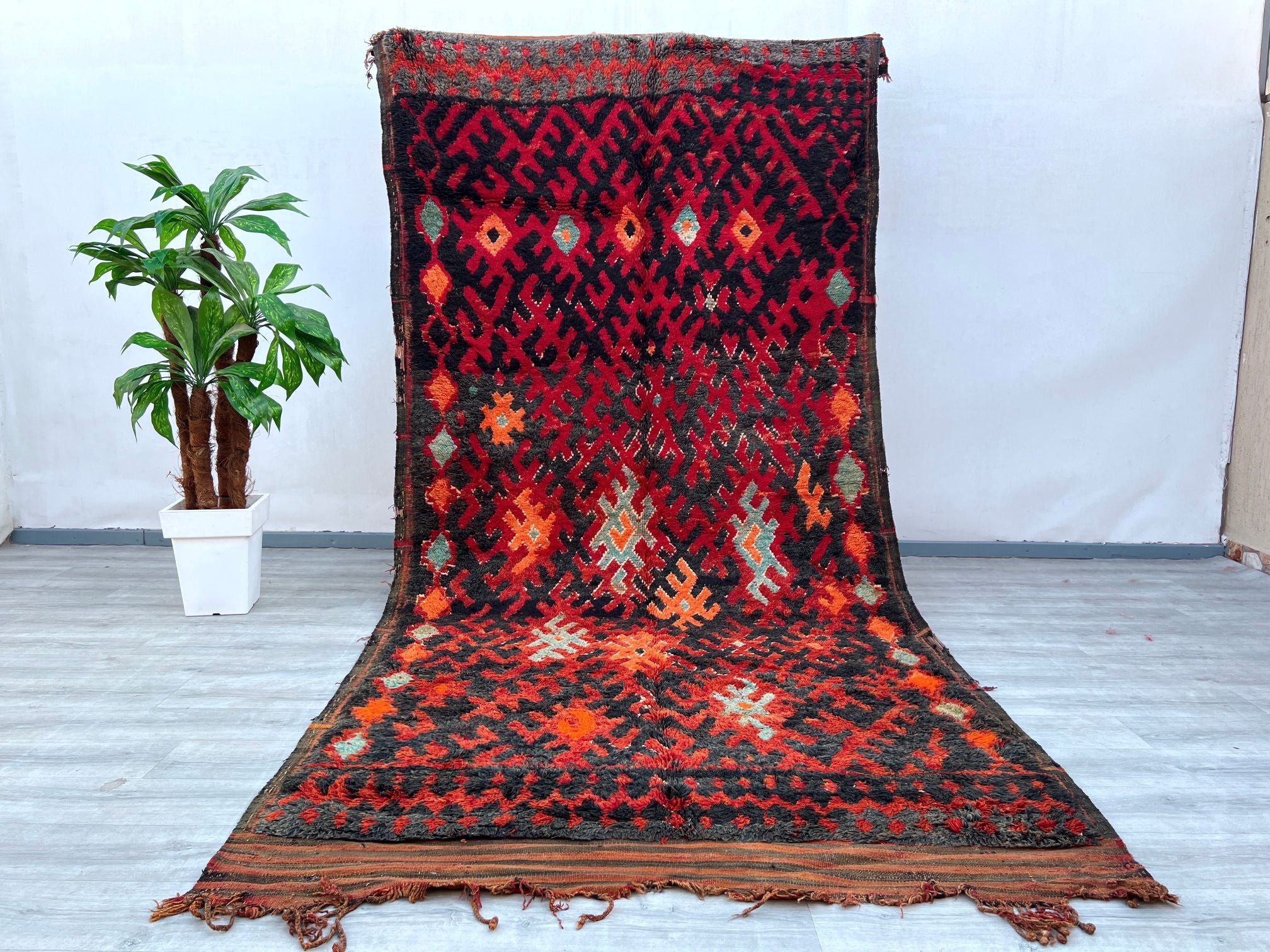 Discover the beauty of a handwoven Afghan Kilim rug, a stunning vintage piece featuring bold geometric patterns and earthy tones. Crafted using traditional techniques, this flatweave rug is made from natural wool, offering durability and a soft texture underfoot. Its faded hues and tribal motifs make it a versatile choice for boho, farmhouse, or minimalist decor. Whether used as a living room centerpiece, a bedroom accent, or a wall hanging, this Kilim rug adds a touch of nomadic elegance to any setting. A 