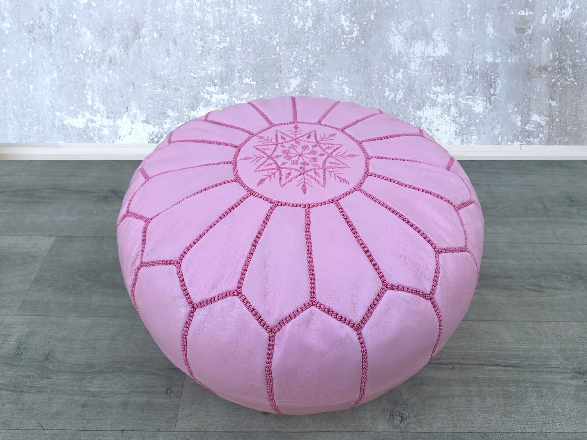 Discover high-quality leather ottomans that blend sophistication and practicality. From genuine leather storage ottomans with lift-top designs to tufted leather benches, our collection offers versatile seating and hidden storage. Ideal for living rooms, bedrooms, or entryways, these leather footstools come in mid-century modern, Moroccan, and contemporary styles. Choose between square, round, or cube leather poufs in tan, black, or brown. Handcrafted for durability, these leather coffee table ottomans also 