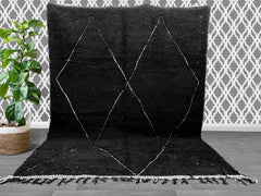 Transform your space with premium Moroccan rugs, including Beni Ouarain, Boujad, and Azilal designs. Handcrafted by Berber weavers, these wool and cotton rugs feature bold patterns, tribal motifs, and vintage finishes. The Beni Ouarain collection offers plush, high-pile rugs in black-and-white, while Boujad rugs showcase vibrant colors and intricate details. For a modern touch, Azilal rugs blend abstract art with traditional weaving. Shop hand-knotted, custom-sized rugs on 1stDibs, Chairish, and Les Nomades