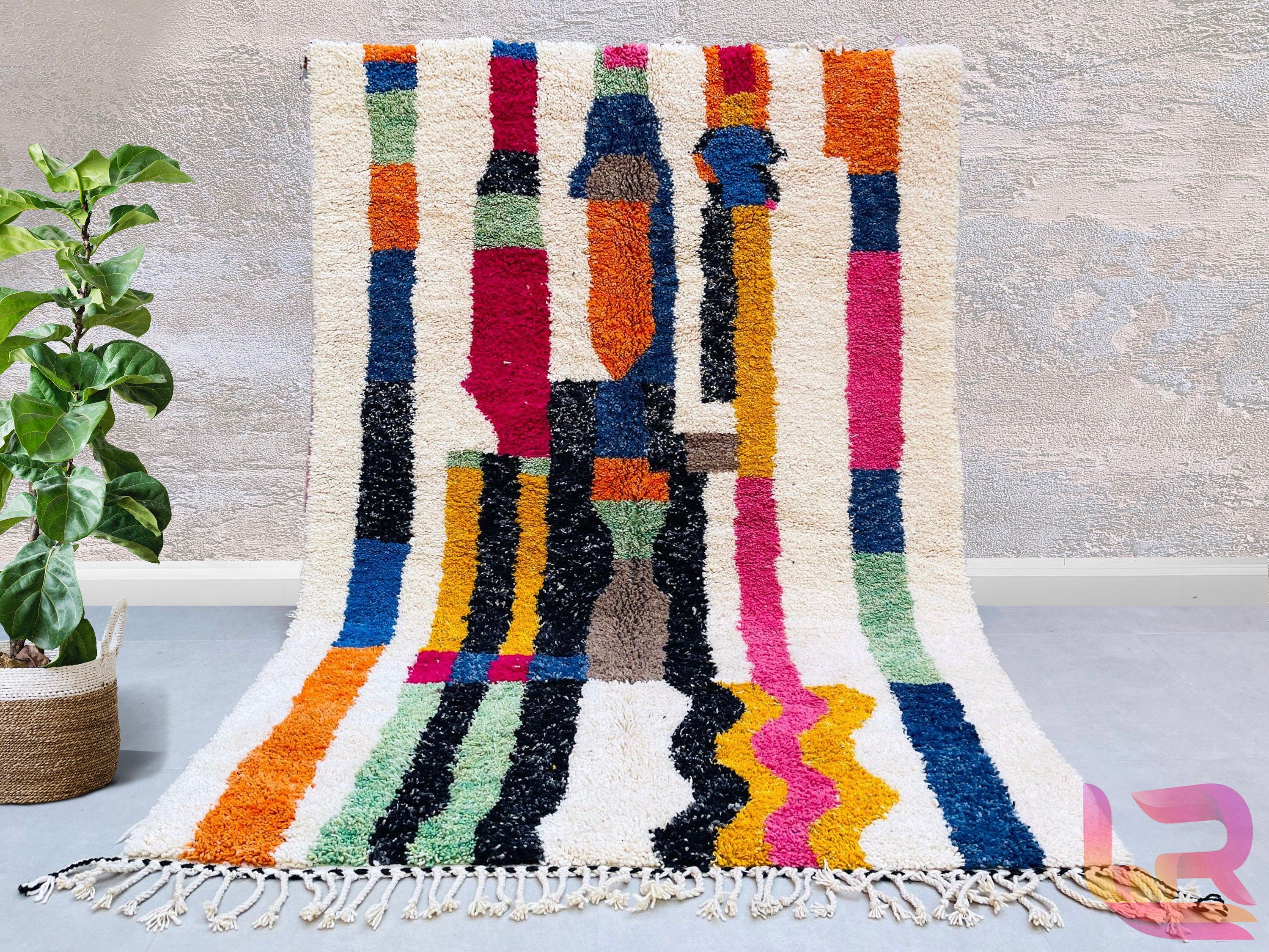 Bring Moroccan artistry into your home with our handmade Berber rugs, crafted from premium wool for unmatched softness and durability. Choose from Beni Ourain-style carpets, vibrant Boujaad rugs, or abstract Azilal designs, each woven with traditional techniques passed down through generations. Whether you need a custom-sized area rug, a runner for hallways, or a statement piece for your living room, our collection offers authentic Moroccan rugs in various colors and patterns. Perfect for boho, mid-century,