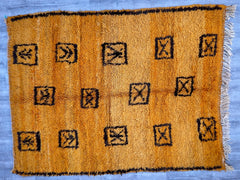 Bring rustic charm into your home with this vintage Moroccan Boujaad rug, a hand-knotted wool masterpiece (5x7 ft) featuring rich, earthy tones and intricate geometric designs. Known for their durability and cultural significance, these rugs are woven by Berber tribes using age-old techniques. The distressed vintage look adds character, making it a perfect fit for boho, farmhouse, or eclectic interiors. Whether used as a statement piece or a cozy floor accent, this rug combines artistry and functionality wh