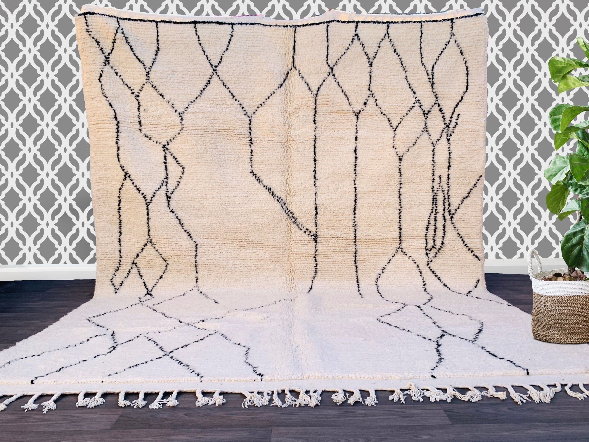 Discover the beauty of a handcrafted vintage Beni Ourain rug, a 100% wool Moroccan carpet that blends traditional Berber artistry with modern boho aesthetics. Each unique piece is handwoven in Morocco, featuring plush, high-pile wool for unmatched comfort underfoot. Ideal for living rooms, bedrooms, or nurseries, this Moroccan area rug comes in custom dimensions to fit any decor style—from Scandinavian minimalism to eclectic bohemian. Check out Etsy, MusMus Rugs, or Les Nomades De Marrakech for authentic, e