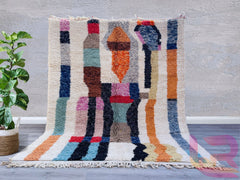 Discover the timeless beauty of an Authentic Beni Ourain Moroccan Rug, handcrafted by skilled Berber artisans using premium wool. These handmade Berber carpets feature intricate tribal patterns, blending traditional craftsmanship with modern boho aesthetics. Perfect for living rooms, bedrooms, or entryways, each Moroccan wool rug is unique, offering warmth, texture, and cultural charm. Available in custom sizes, from cozy 5x8 ft to large 9x12 ft, our Beni Ourain-style rugs add elegance to any space. Whether