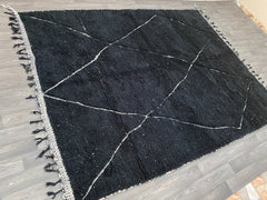 Enhance your home with a Zanafi Kilim rug, a Moroccan flat-weave carpet known for its durable cotton or wool blend and minimalist aesthetic. These handmade Berber rugs feature neutral tones (black, grey, white) and geometric designs, making them versatile for Scandinavian, farmhouse, or boho-chic interiors. Available in 7x10, 6x9, and custom sizes, Zanafi rugs are lightweight, easy to clean, and perfect for high-traffic areas. Find them on Etsy, AfriKesh, and eBay, with options for free shipping. Whether fo